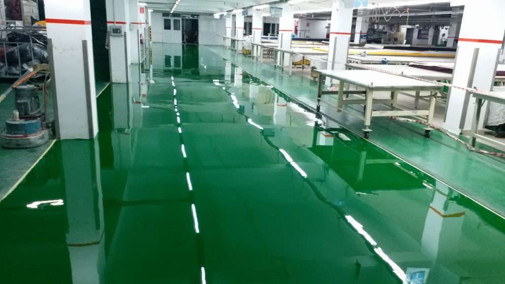Bề mặt sàn nhà xưởng Công ty TNHH Hansoll Vina sau khi hoàn thành quy trình thi công sơn tự san phẳng Epoxy – ECOBRID PAINT.